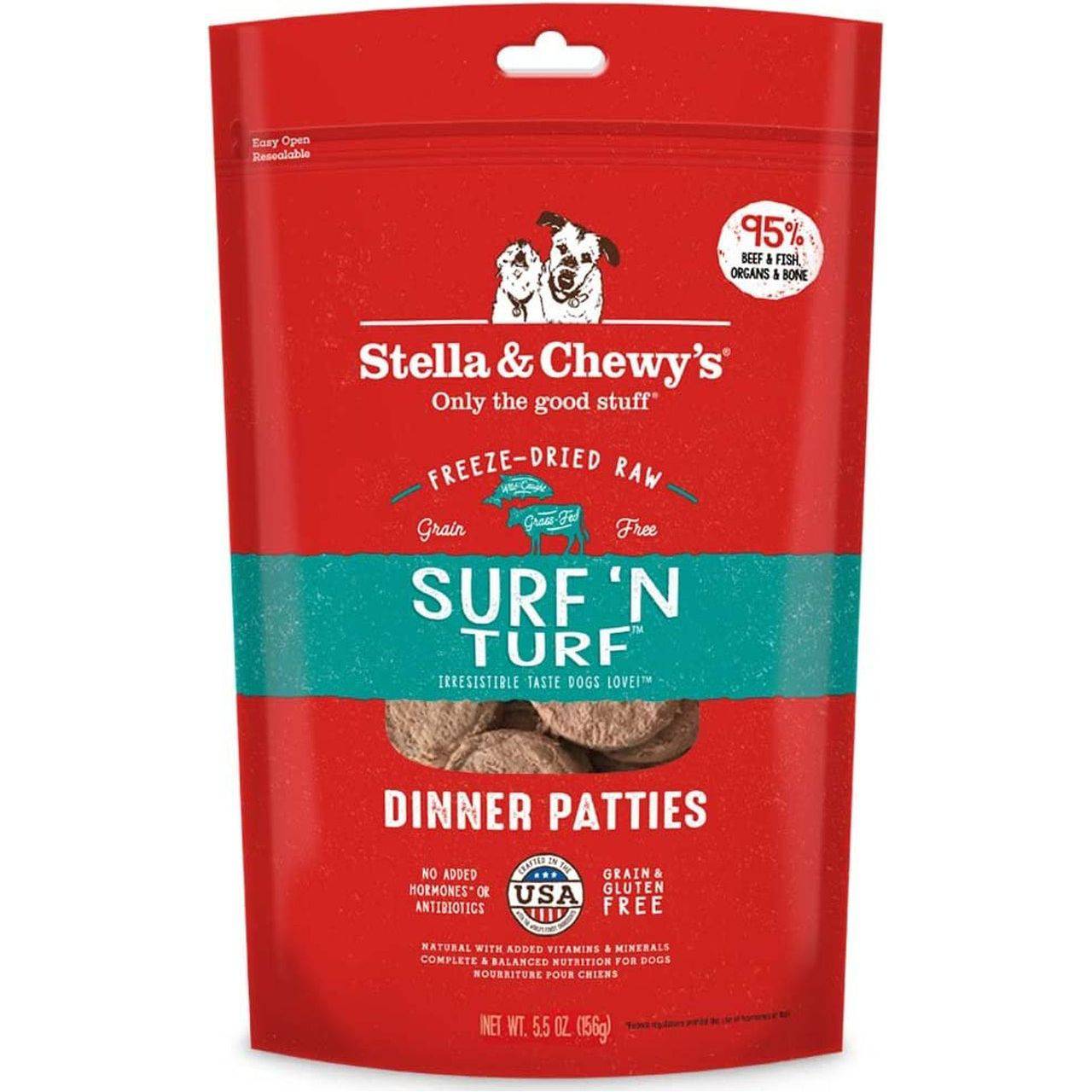 A red-colored packaging of Stella & Chewy's Surf 'N Turf Freeze-Dried Raw Dinner Patties for dogs, indicating that the product is 95% beef, fish, organs, and bone, with no added hormones or antibiotics, and is grain and gluten-free.