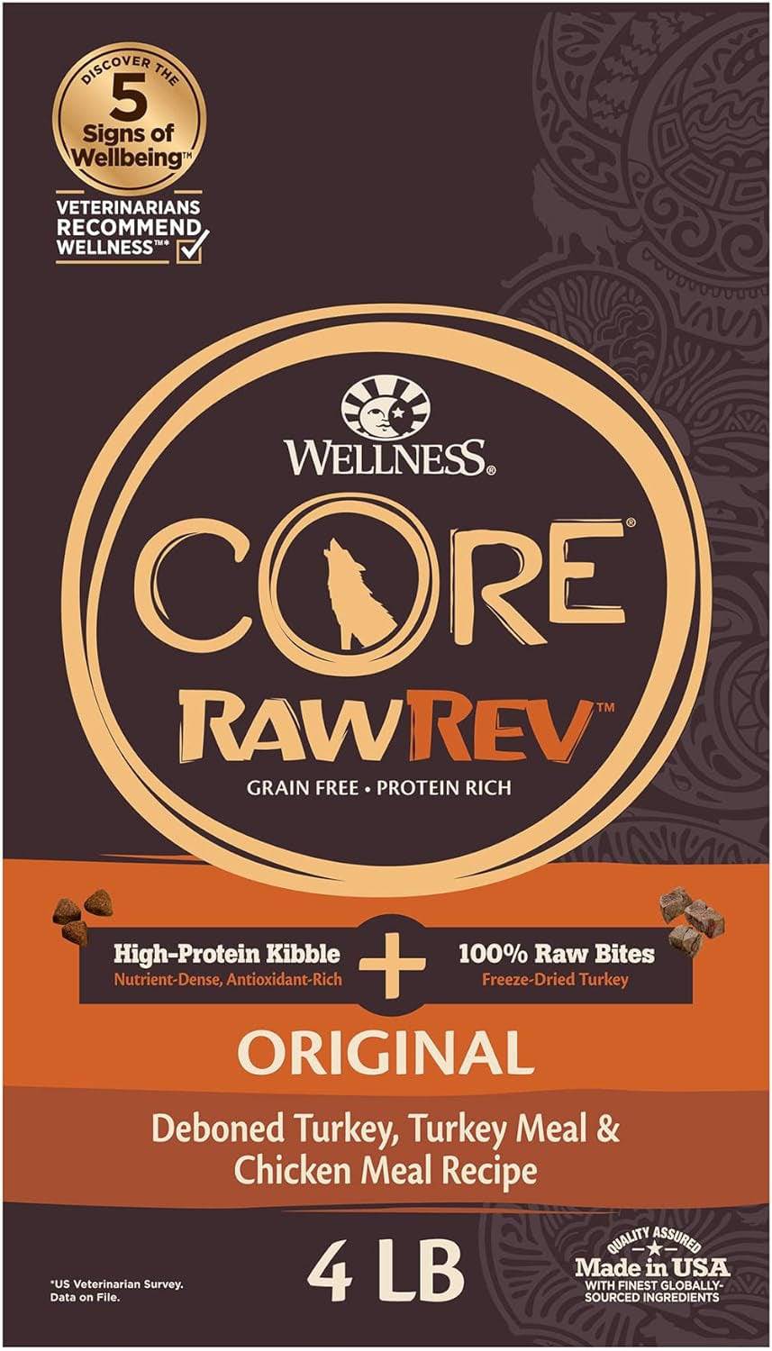 A brown and orange dog food bag with a wolf silhouette, the brand name "WELLNESS CORE" in bold letters, the words "RawRev Grain Free Protein Rich" below it, and text that reads "High-Protein Kibble + 100% Raw Bites Freeze-Dried Turkey" above the product name "ORIGINAL Deboned Turkey, Turkey Meal & Chicken Meal Recipe With Freeze-Dried Turkey" on a 4-pound bag. The label also has emblems stating "Veterinarians recommend wellness" and "Made in USA with finest globally-sourced ingredients".