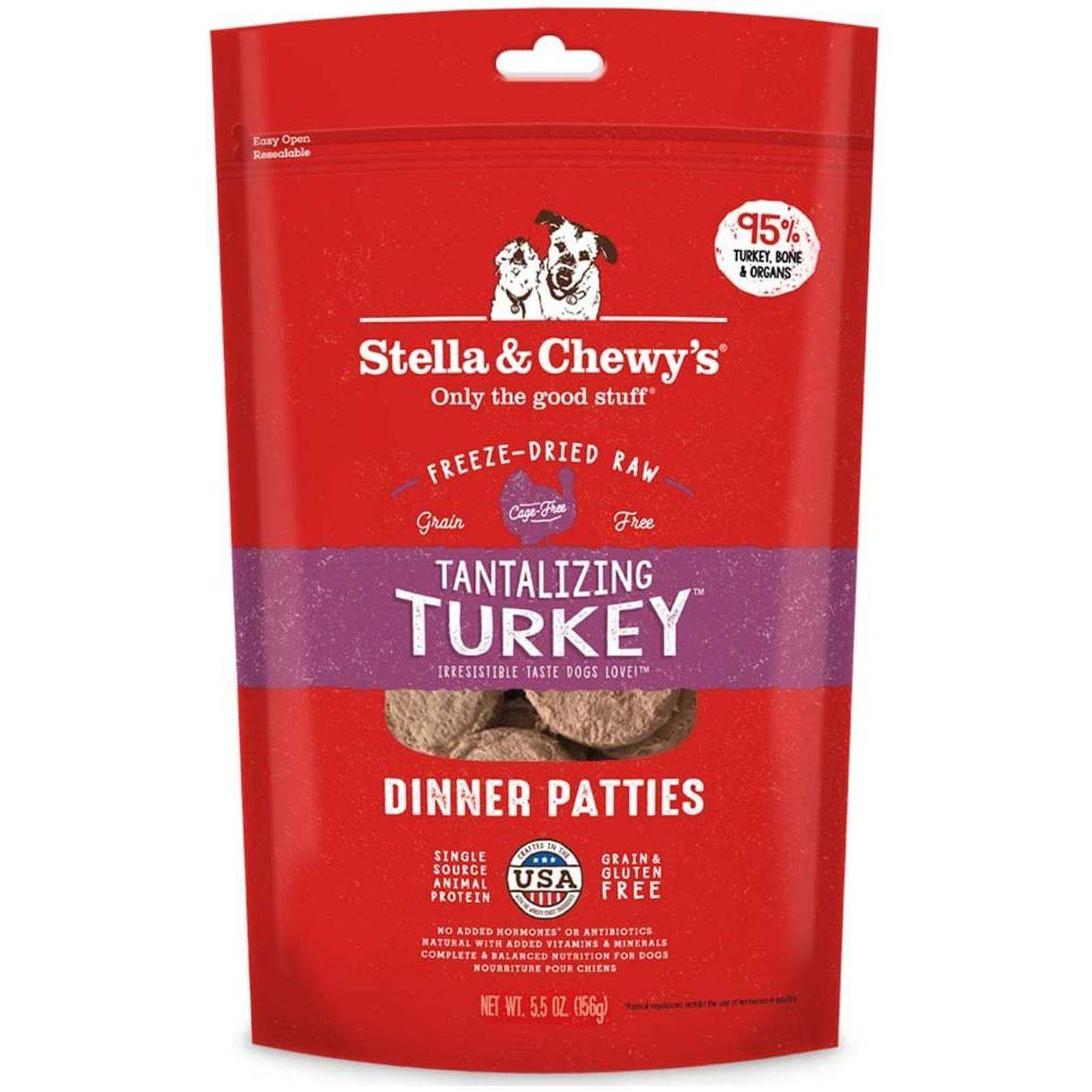 A red and purple bag of Stella & Chewy's Freeze Dried Patties brand freeze-dried raw dog food in the Tantalizing Turkey flavor, featuring two cartoon dogs on the label and advertised as grain and gluten-free with 95% turkey, bone, and organs. The bag is resealable and contains dinner patties with a net weight of 5.5 oz (156g).