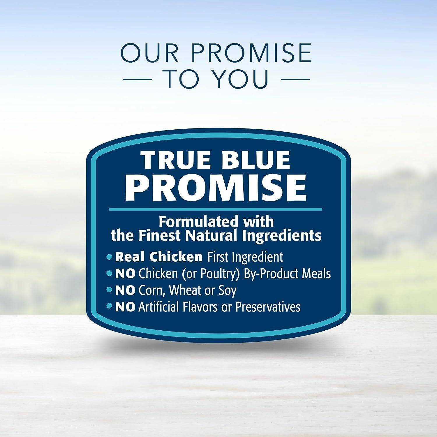 A blue badge with the text "OUR PROMISE TO YOU" at the top and "TRUE BLUE PROMISE" in bold letters, followed by bullet points that read "Formulated with the Finest Natural Ingredients, Real Chicken First Ingredient, NO Chicken (or Poultry) By-Product Meals, NO Corn, Wheat or Soy, NO Artificial Flavors or Preservatives."