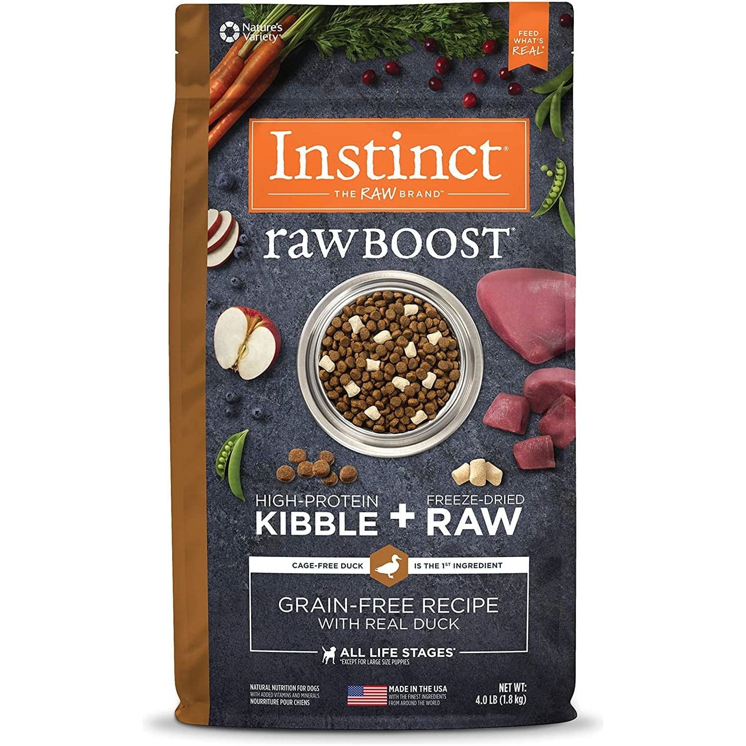 A product packaging for Instinct RawBoost high-protein kibble with freeze-dried raw pieces for dogs, emphasizing cage-free duck as the primary ingredient. The package includes images of raw and freeze-dried ingredients such as meat, vegetables and berries, with informational text accentuating its grain-free formulation and suitability for all life stages.