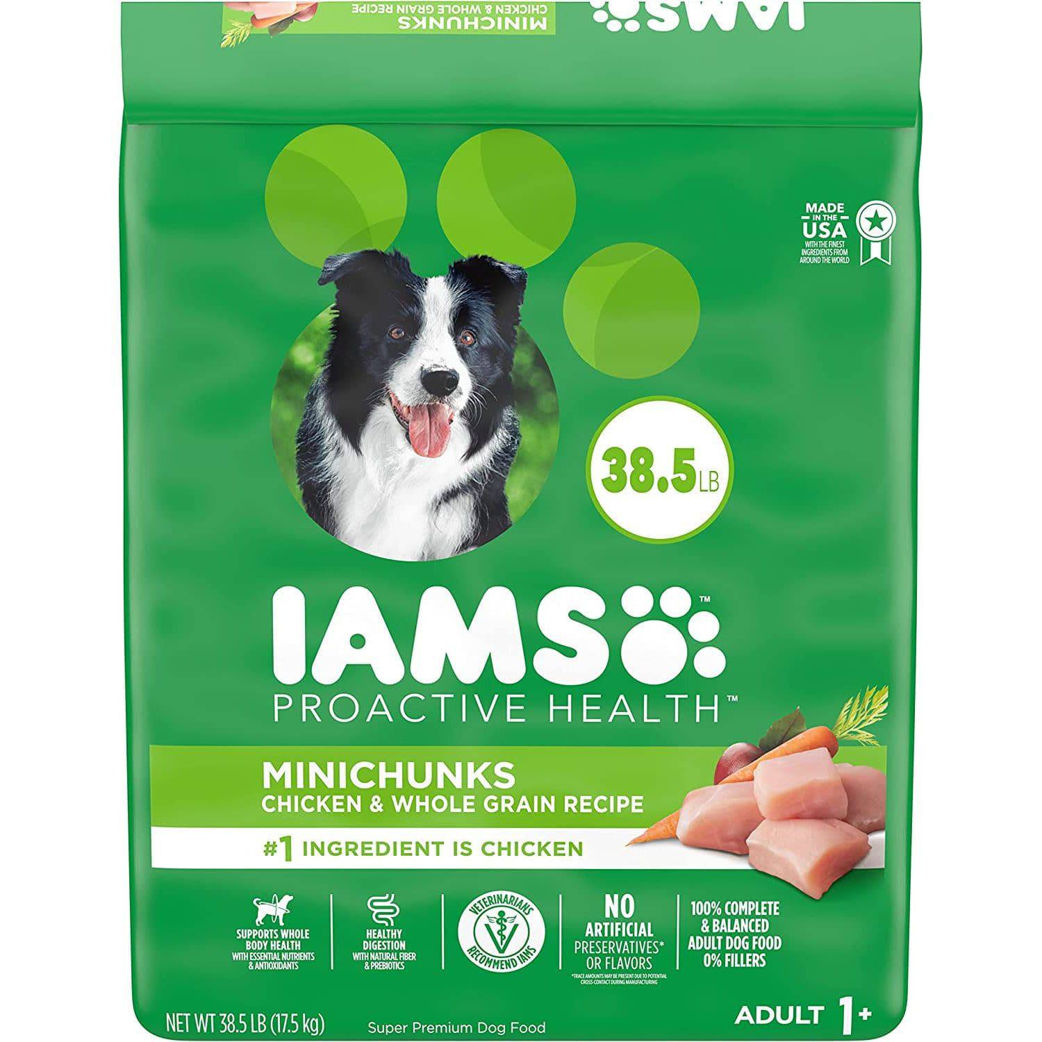 A green bag of IAMS Proactive health adult dog food, 38.5 pounds, with a happy black and white dog on the front. The food is described as minichunks, chicken and whole grain recipe, with no artificial preservatives or flavors.