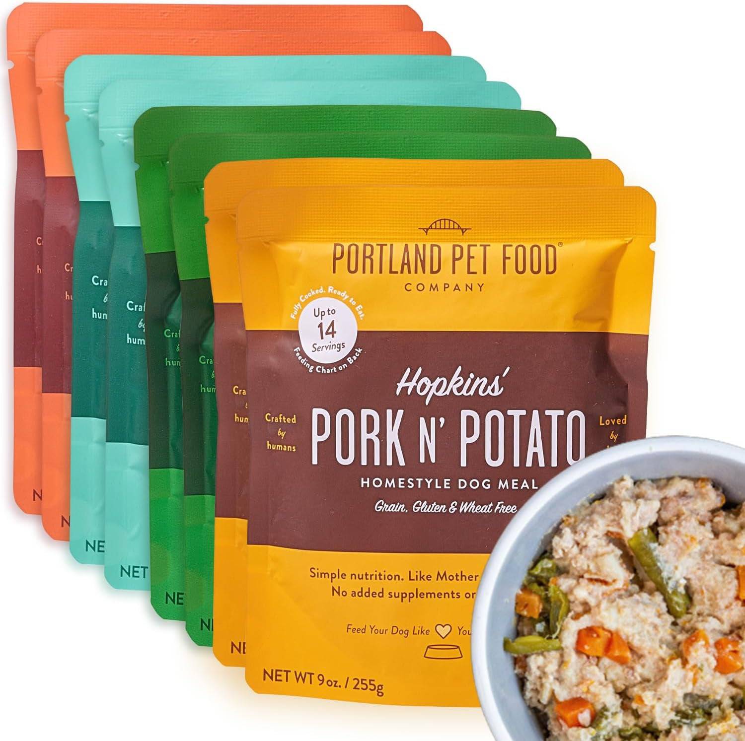 Front packaging of Portland Pet Food in multiple individual packs, featuring vibrant labels showcasing the wholesome ingredients within.