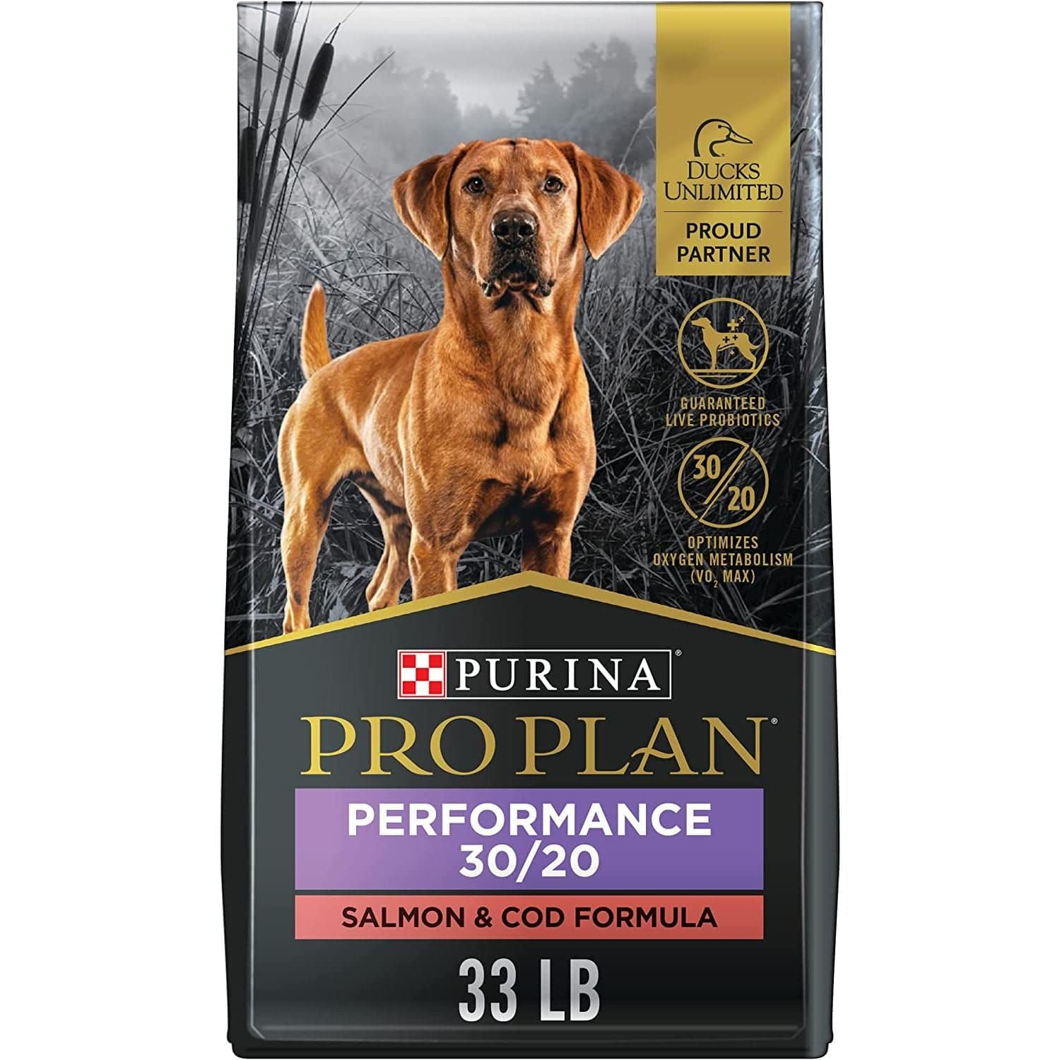 A 33-pound bag of  Purina Performance 30/20 Salmon & Cod Formula dog food with the Ducks Unlimited proud partner logo and a guarantee of live probiotics for digestive and immune health. The packaging features an image of a golden Labrador retriever standing in a marshy landscape.