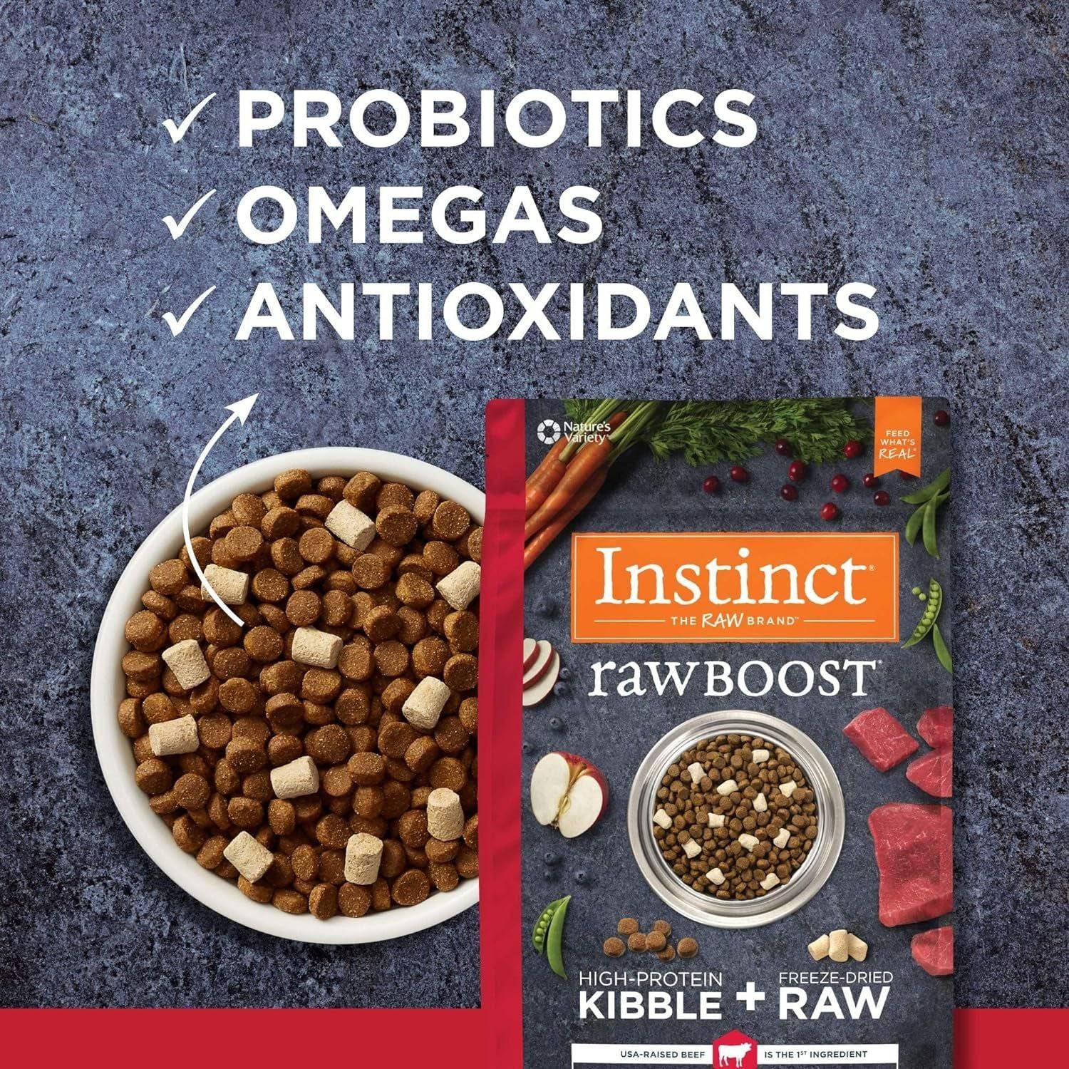 Marketing image for Instinct Raw Boost dog food featuring a bag of high-protein kibble mixed with freeze-dried raw bits. The image highlights the product's benefits such as probiotics, omegas, and antioxidants, and shows a bowl filled with the dog food mix next to the packaging.