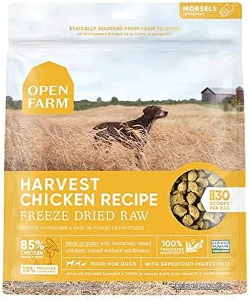 A package of Open Farm Harvest Chicken Recipe dog food featuring a chocolate Labrador in a field on the top half and product information with images of the freeze-dried food pellets on the bottom half.