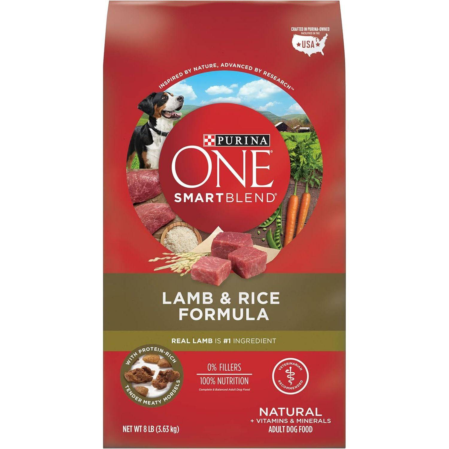 A bag of Purina ONE Smartblend Lamb and Rice Formula dog food with a picture of a dog and an image of raw lamb chunks, rice, and vegetables on the front. The label says real lamb is the number one ingredient with 0% fillers and 100% nutrition. The bag is 8 lb (3.63 kg) and is for adult dogs with added vitamins and minerals.