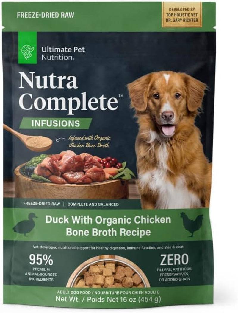 A bag of Nutra Complete freeze-dried raw dog food, with the flavor "Duck with Organic Chicken Bone Broth Recipe." There is an image of a happy golden retriever on the front, along with information about the product being developed by top holistic veterinarian Dr. Gary Richter, containing 95% premium animal-sourced ingredients, and having no fillers, artificial preservatives, or added grain.